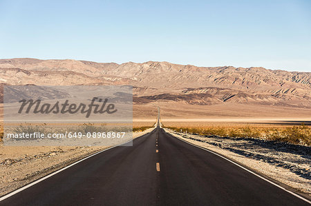 Landscape with straight road in Death Valley National Park, California, USA