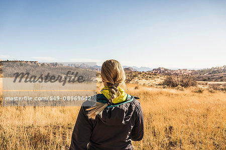 Woman looking at view, rear view, Zion National Park, Springdale, Utah, USA