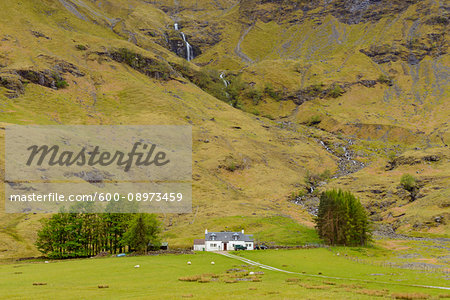 Isolated home in the highlands at Glen Coe in Scotland, United Kingdom