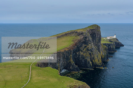 Scottish coast with Neist Point Lighthouse on the Isle of Skye in Scotland, United Kingdom Scottish coast with Neist Point Lighthouse on the Isle of Skye in Scotland, United Kingdom