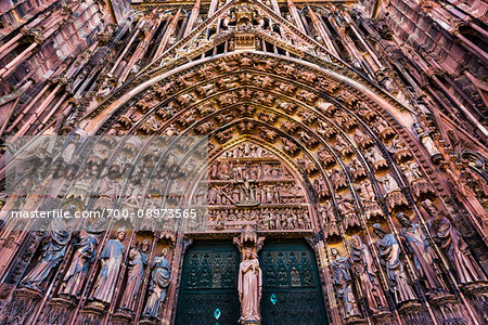 Close-up of the high-relief sculptures at the entrance Strasbourg Catehdral (Cathedral Notre Dame of Strasbourg) in Strasbourg, France