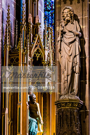 Statues and gothic architectural details of the interior of the Strasbourg Cathedral (Cathedral Notre Dame of Strasbourg) in Strasbourg, France