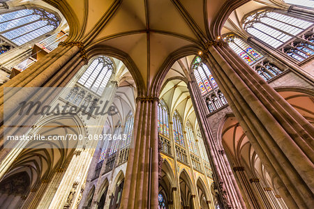 Structural framework of columns and vaulted ceilings inside the Cologne Cathedral in Cologne (Koln), Germany Structural framework of columns and vaulted ceilings inside the Cologne Cathedral in Cologne (Koln), Germany