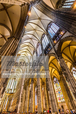 Rows of structural columns with vaulted ceiling inside the Cologne Cathedral in Cologne (Koln), Germany