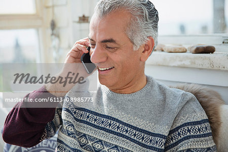 Senior man talking on cell phone