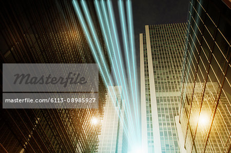 Fiber optic light trail communication technology streaming through highrise buildings, concept