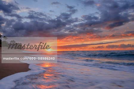 Sunset and surf on the Pacific Ocean at Sunset Beach on Oahu, Hawaii, USA Sunset and surf on the Pacific Ocean at Sunset Beach on Oahu, Hawaii, USA