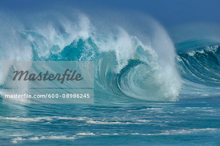 Big dramatic wave on a sunny day in the Pacific Ocean at Oahu, Hawaii, USA Big dramatic wave on a sunny day in the Pacific Ocean at Oahu, Hawaii, USA