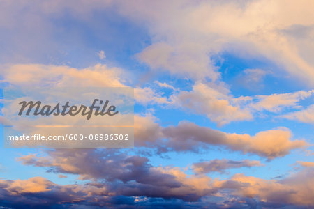 Clouds and blue sky at sunset over the Isle of Skye in Scotland, United Kingdom