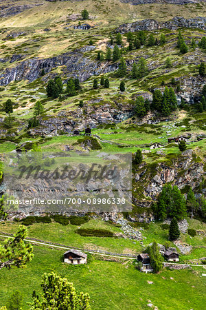 Hiking trail though the mountain village of Zmutt near Zermatt in Switzerland