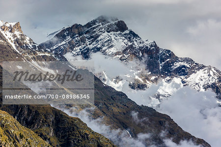 Mountain tops and mist in the Pennine Alps at Zermatt in Switzerland