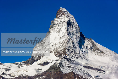 Close-up of the snow covered Matterhorn summit in spring on a sunny day at Zermatt, Switzerland
