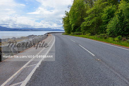 Coastal road in the Scottish Highlands near Armadale on the Isle of Skye in Scotland, United Kingdom