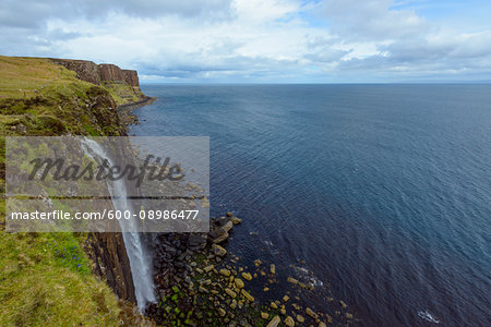 Mealt Waterfall with Kilt Rock on the Trotternish Peninsula on the Isle of Skye in Scotland, United Kingdom