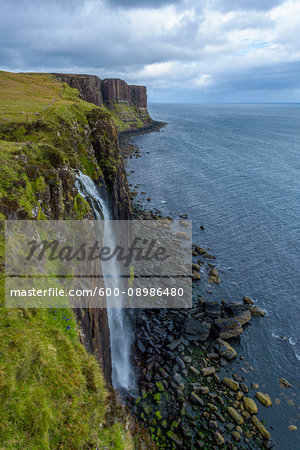 Mealt Waterfall with Kilt Rock on the Trotternish peninsula on the Isle of Skye in Scotland, United Kingdom