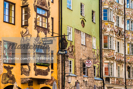 Row of colorful buidlings decorated with frescoes in the Old Town in Innsbruck, Austria