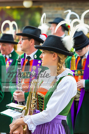 Close-up of musicians in Austrian traditional dress at the Feast of Corpus Christi Procession in Seefeld, Austria