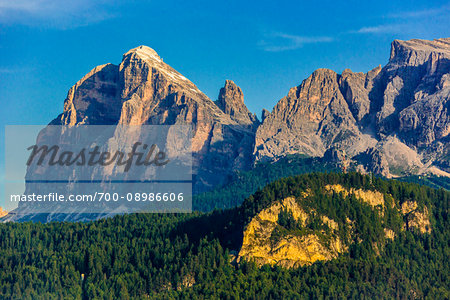 Early morning sunlight reflecting on the mountains at Cortina d'Ampezzo in the Dolomites, Southern Alps region of Italy