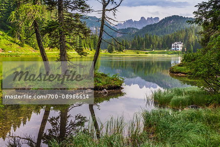 Scenic view of mountains reflected in Lake Misurina in the Dolomites near Cortina d'Ampezzo, Italy