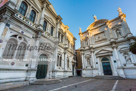 The Scuola Grande di San Rocco on the left and the Church of Saint Roch on the right at Campo San Rocco in Venice, Italy