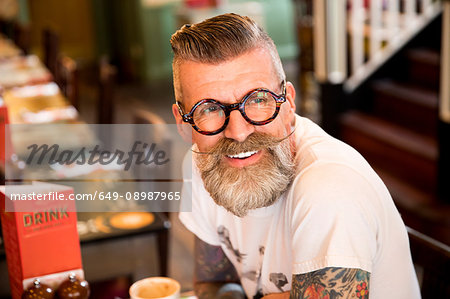 Quirky man in bar and restaurant, Bournemouth, England