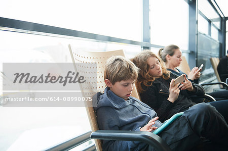 Family at airport on way to holiday, Copenhagen, Denmark