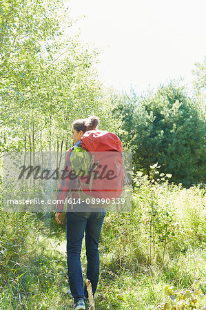 Woman hiking, rear view, Colgate Lake Wild Forest, Catskill Park, New York State, USA