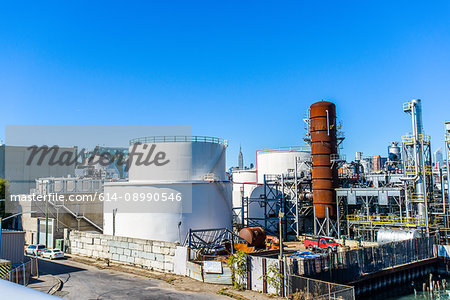 Elevated view of storage tanks and pipes at biofuel industrial plant