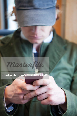 Man using smart phone