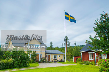 Swedish flag in front of house