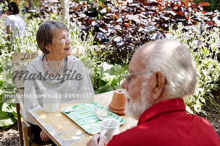 Senior couple having coffee together