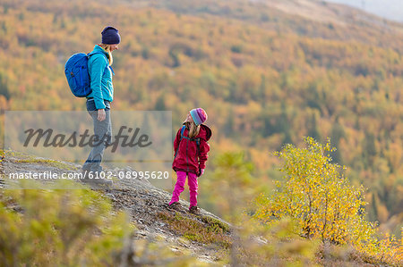 Mother with daughter hiking