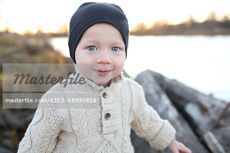 Smiling boy at lake