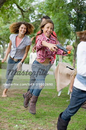 Children playing together in backyard