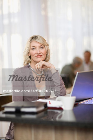 Businesswoman sitting at desk