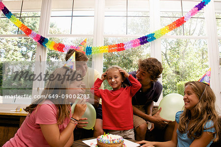 Family celebrating boy?s birthday