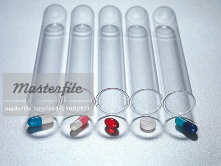 Medicine capsules in test tube