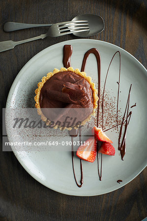 Chocolate tart on plate