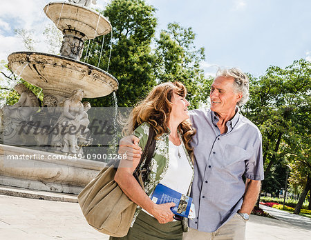 Older couple sightseeing together