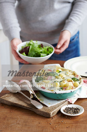 Dish of baked ham and leek gnocchi