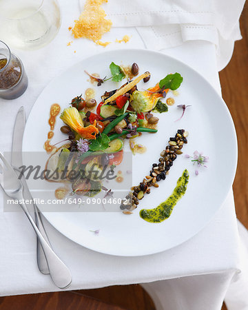 Plate of salad with zucchini, green beans, eggplant and balsamic vinegar Plate of salad with zucchini, green beans, eggplant and balsamic vinegar