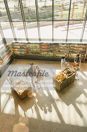 High angle view people grocery shopping in market