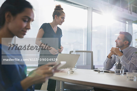 Business people talking in conference room meeting