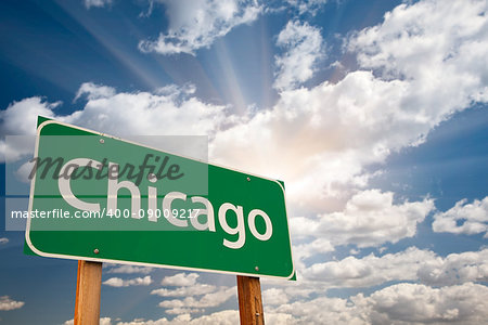 Chicago Green Road Sign Over Dramatic Clouds and Sky.