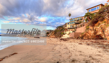 Sunset over the rocks at Pearl Street Beach in Laguna Beach, California, USA