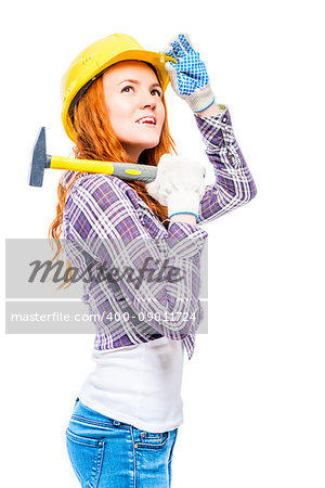 woman in a helmet with a hammer looking up on a white background