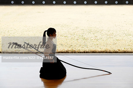 Japanese traditional archery athlete practicing