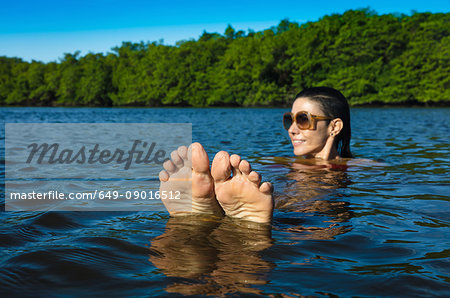 Woman in sea, Fortaleza, Ceara, Brazil, South America