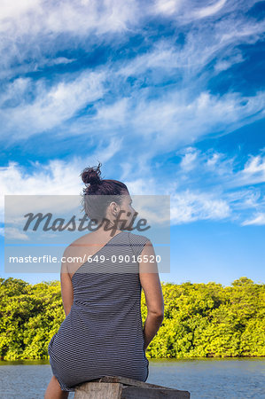 Woman by sea, Fortaleza, Ceara, Brazil, South America