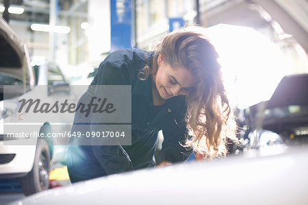 Student at car maintenance class